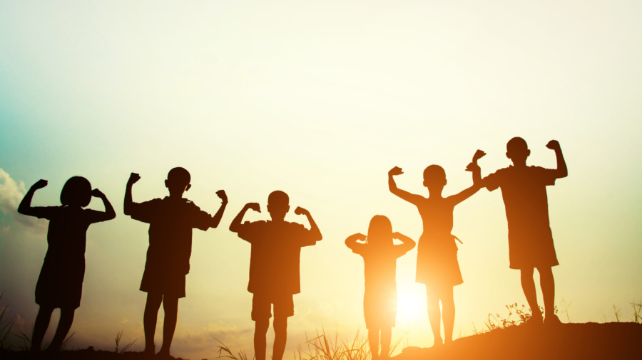 silhouette of a happy children and happy time with sunset.