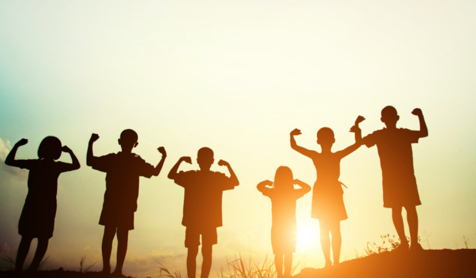 silhouette of a happy children and happy time with sunset.